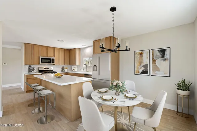 a bedroom with a bed and a potted plant