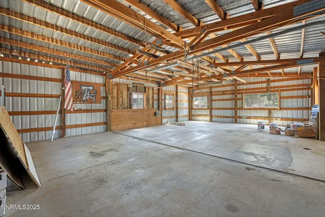 a view of a room with wooden walls