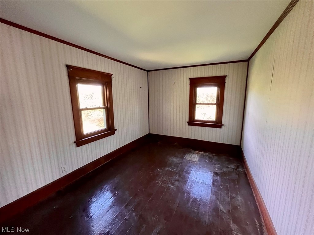 16485 Mock Road Berlin Center, OH 44401 - Photo 23 of 30 Unfurnished room with dark hardwood flooring