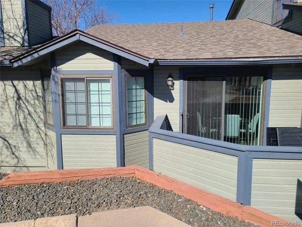 a front view of a house with a porch