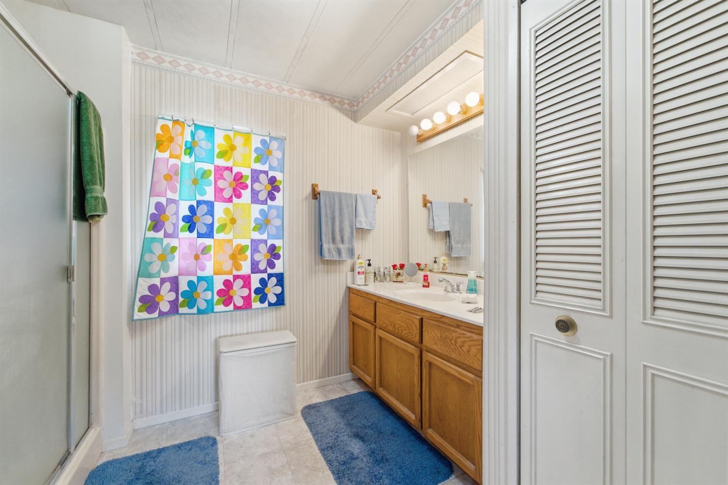 1155 Pease Road, Unit 514 Yuba City, CA 95991 - Photo 5 of 21 a kitchen with stainless steel appliances cabinets and wooden floor