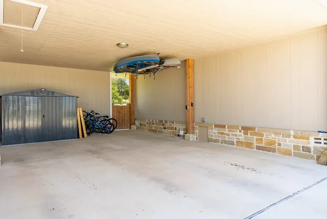 a kitchen with a sink stove and microwave