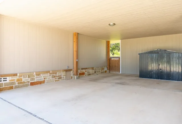 a view of living room with furniture and entryway