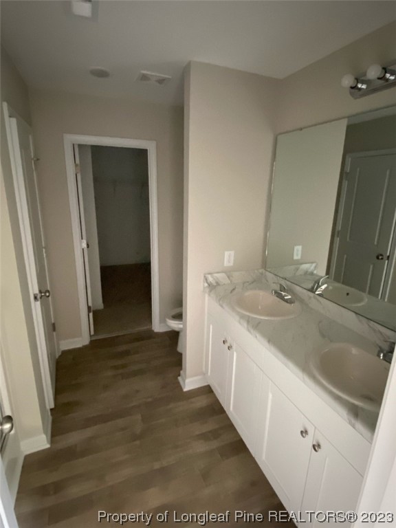 3034 Cricket Road Fayetteville, NC 28306 - Photo 10 of 11 a bathroom with a sink and a mirror