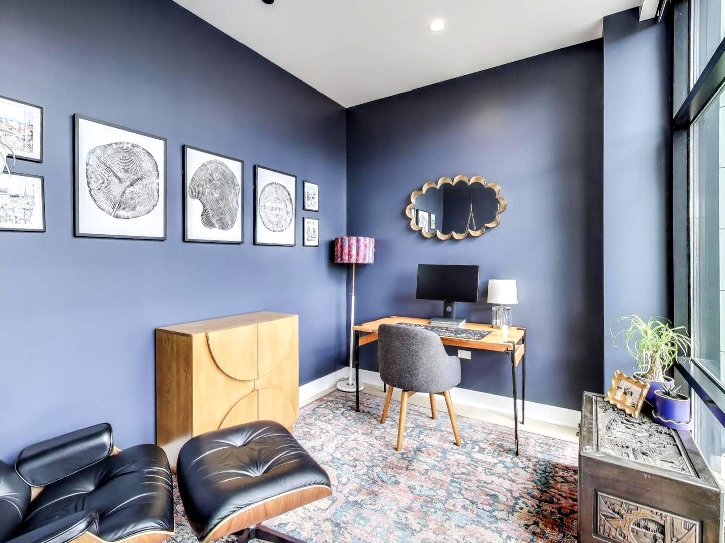 6 North Carpenter Street, Unit 5B Chicago, IL 60607 - Photo 11 of 40 a living room with furniture and a fireplace