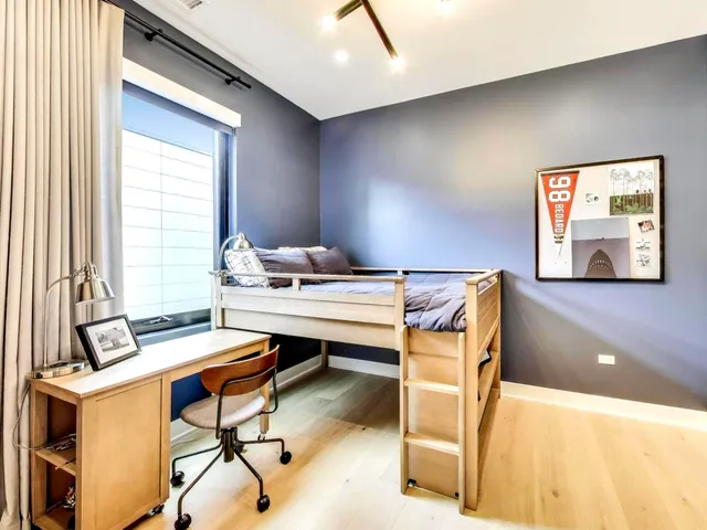 a workspace with furniture and window