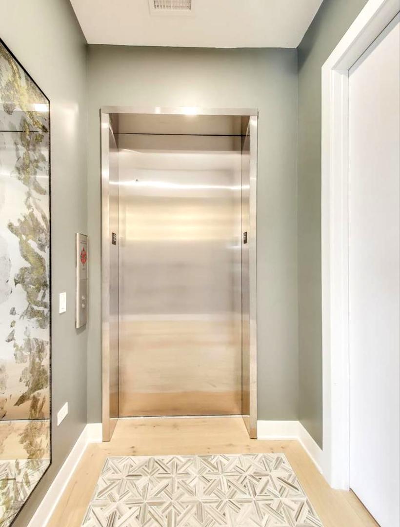 6 North Carpenter Street, Unit 5B Chicago, IL 60607 - Photo 29 of 40 a view of a wooden door