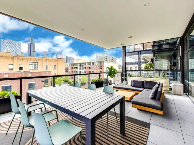 a outdoor space with furniture and a potted plant