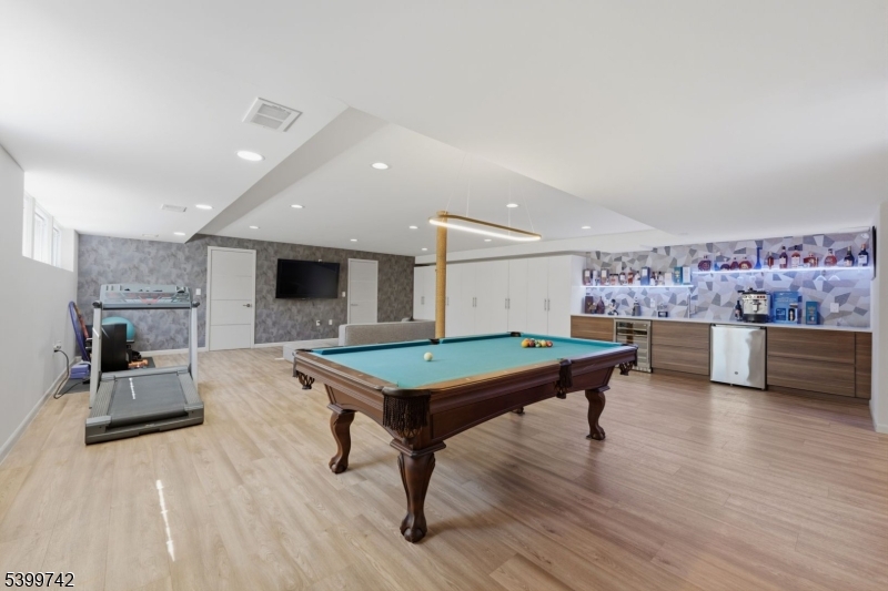 38 Farview Road Millburn, NJ 07041 - Photo 17 of 26 a room with furniture pool table flat screen tv and windows