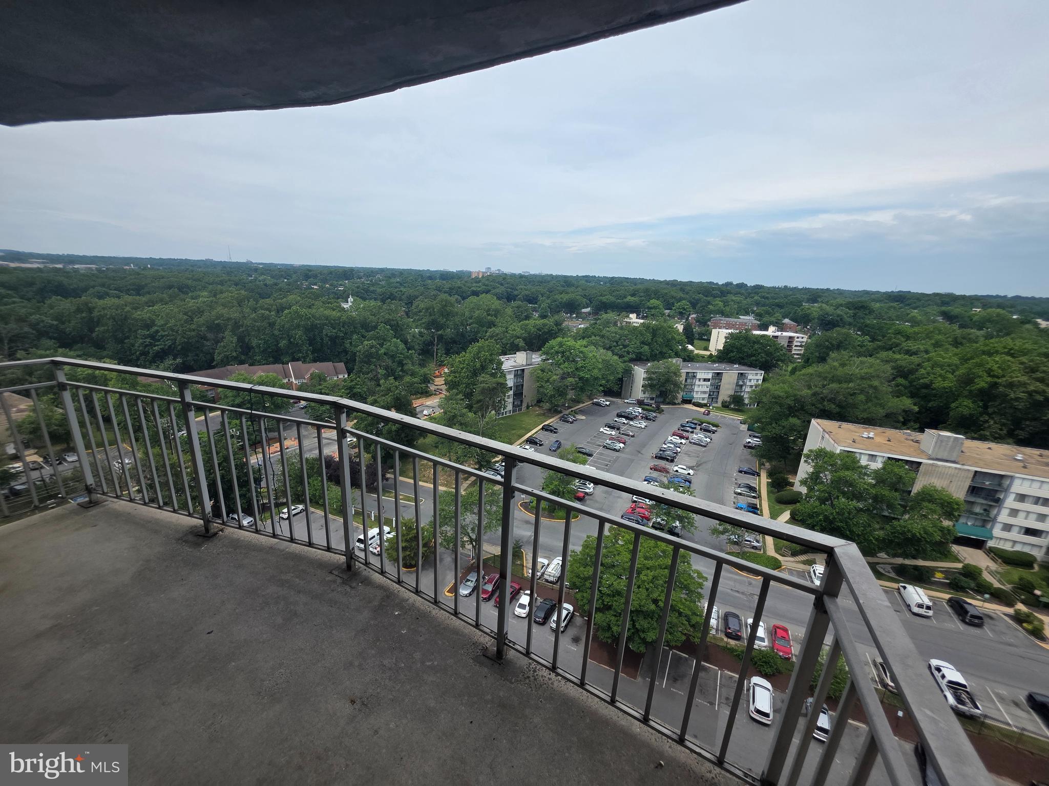 1836 Metzerott Road, Unit 1704 Adelphi, MD 20783 - Photo 32 of 47 a view of a balcony with an outdoor seating