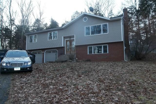 350 Waverly Road Shelton, CT 06484 - Photo 1 of 1 a front view of a house with a garden