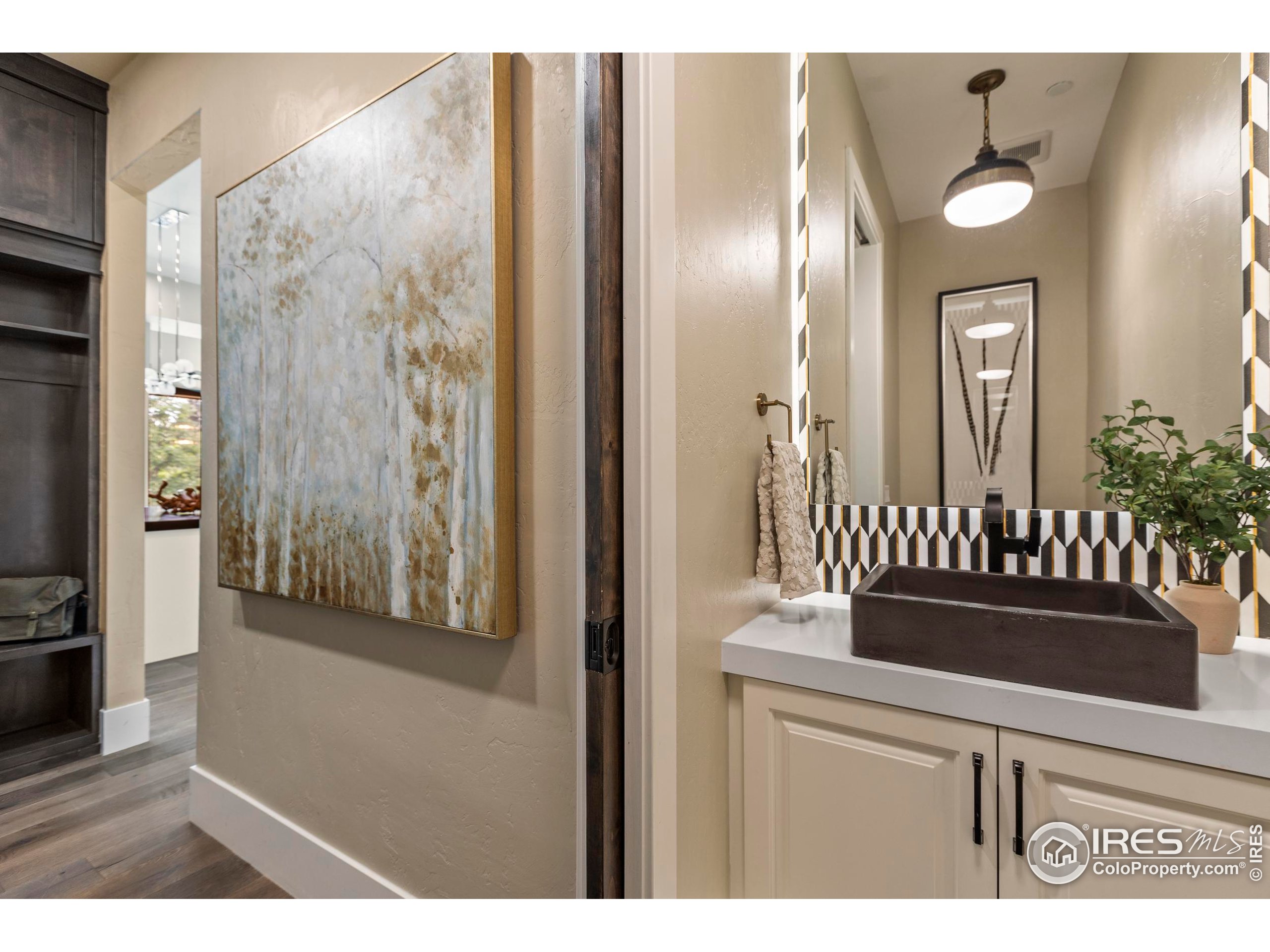 302 North Meldrum Street, Unit 314 Fort Collins, CO 80521 - Photo 11 of 50 a view of a hallway with wooden floor and windows