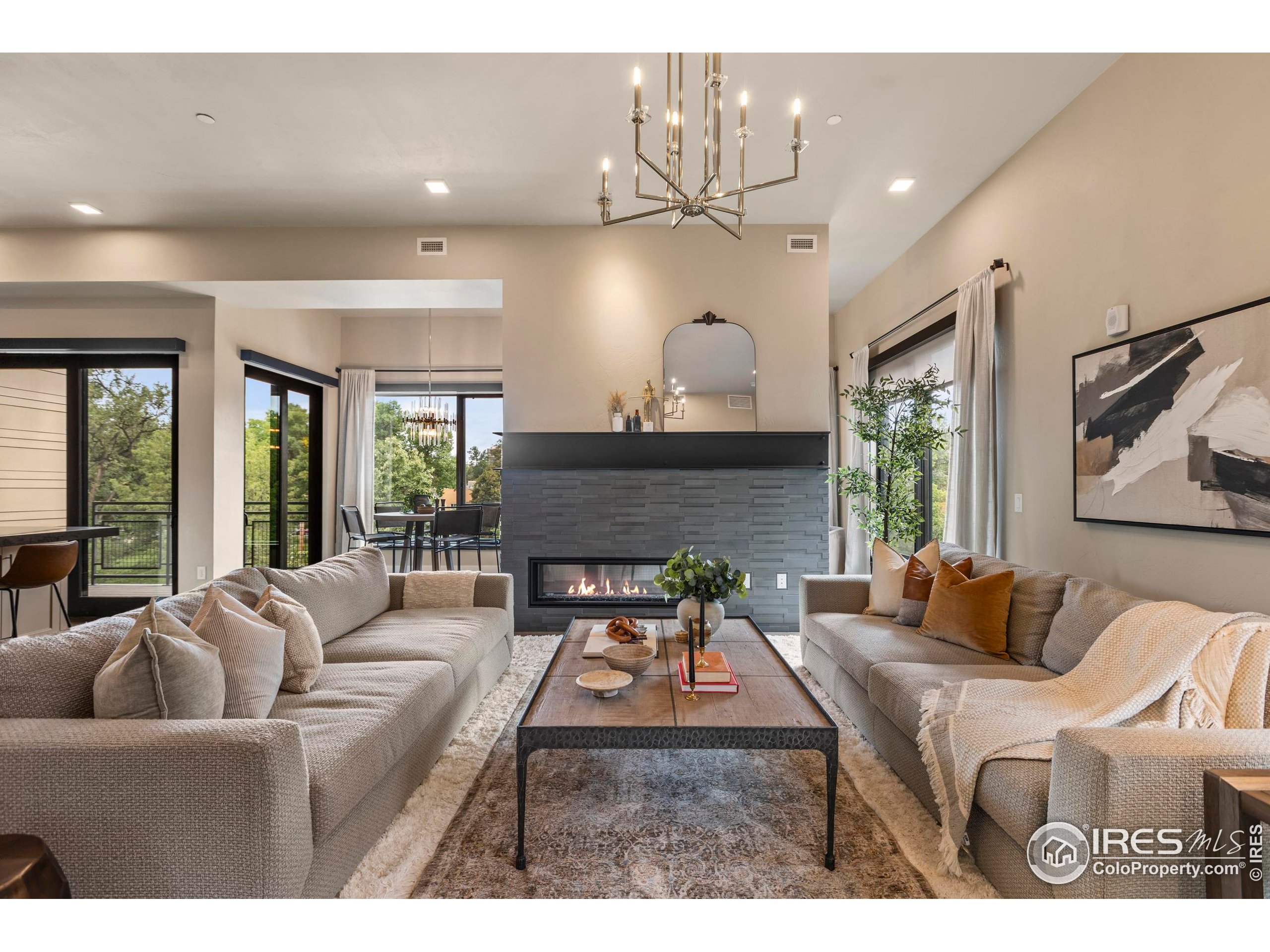 302 North Meldrum Street, Unit 314 Fort Collins, CO 80521 - Photo 15 of 50 a living room with furniture and a large window