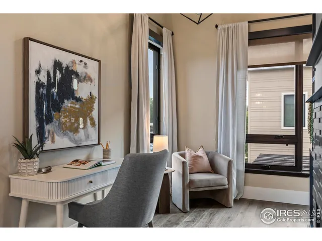 a living room with furniture and window