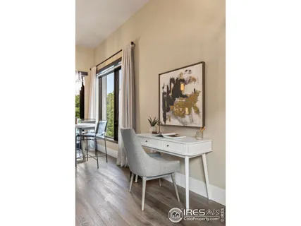 a room with furniture and wooden floor