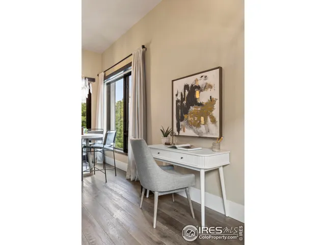 a room with furniture and wooden floor