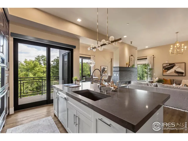 a kitchen with counter space sink and outdoor