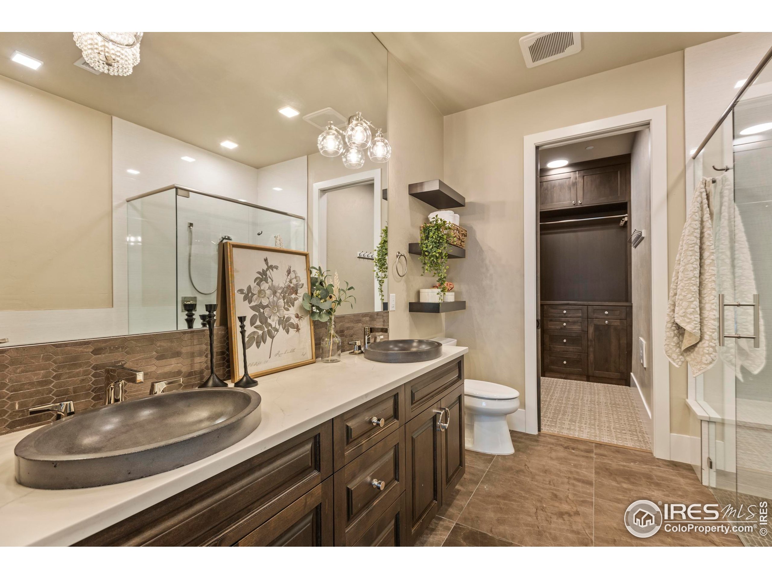 302 North Meldrum Street, Unit 314 Fort Collins, CO 80521 - Photo 31 of 50 a bathroom with a sink a toilet and shower