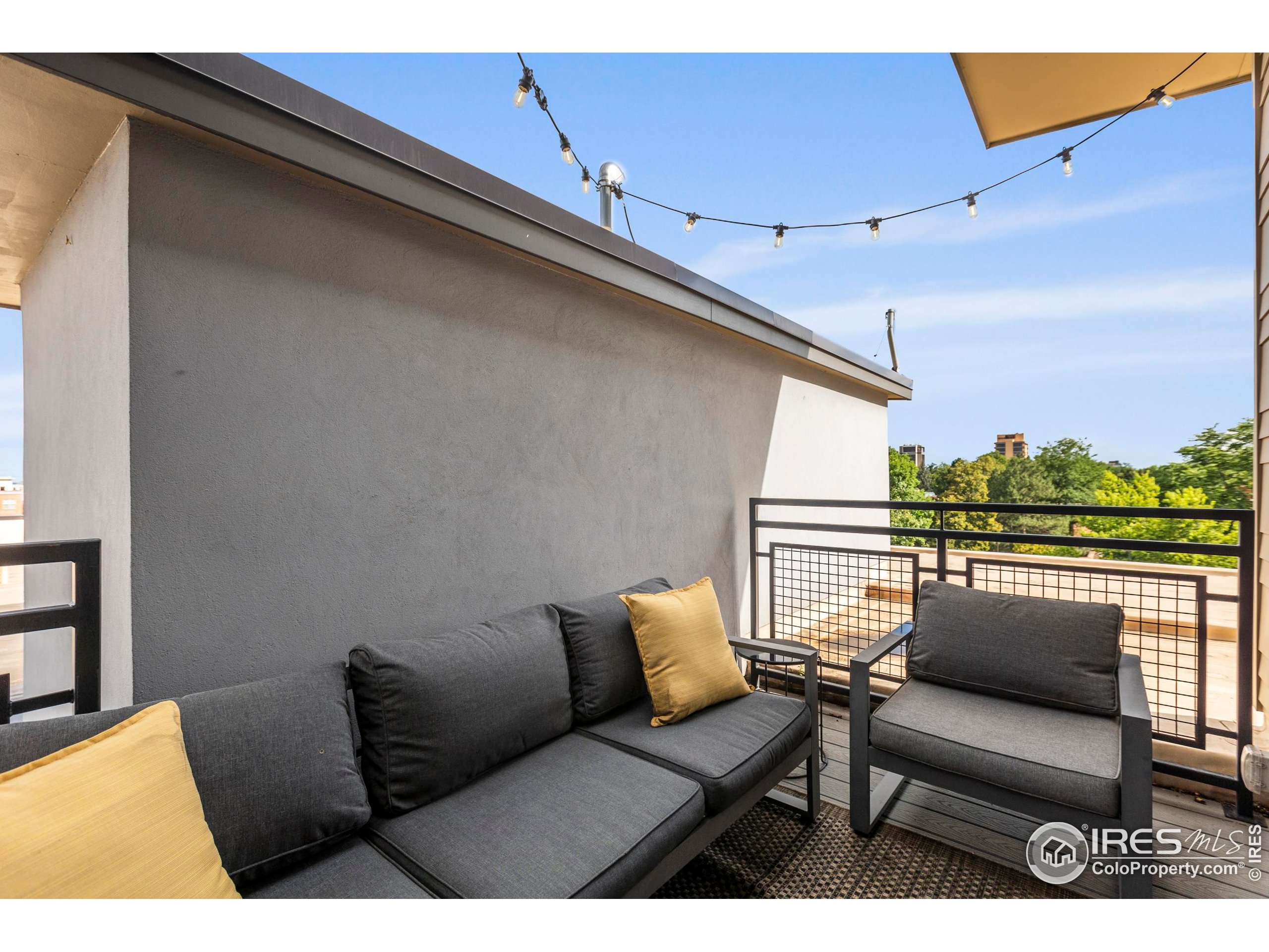 302 North Meldrum Street, Unit 314 Fort Collins, CO 80521 - Photo 46 of 50 a view of roof deck with furniture