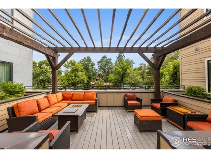 a outdoor sitting area with furniture and outdoor seating