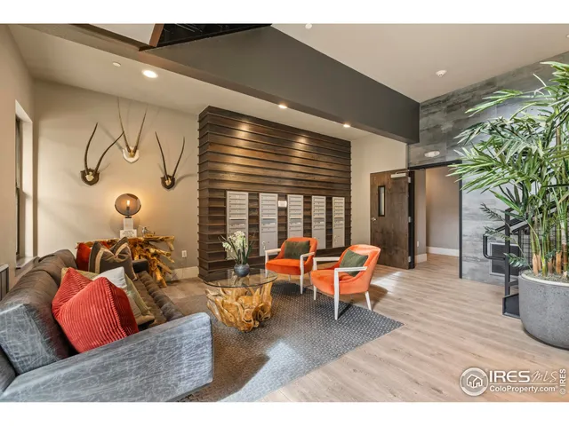 a living room with furniture and window