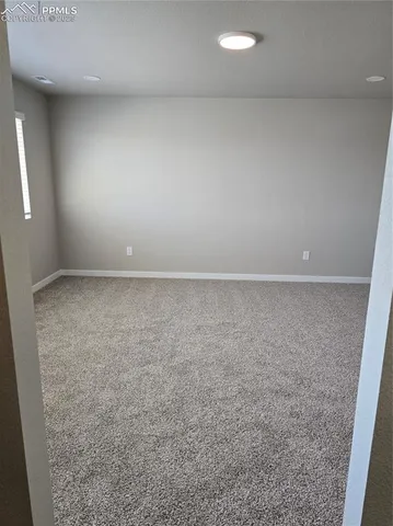 an empty room with a workbench