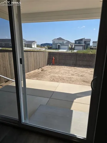 a view of balcony with furniture