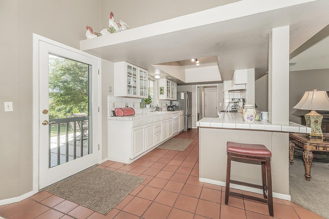 14815 Garlock Lane Prather, CA 93651 - Photo 15 of 80 a kitchen with a sink cabinets and window