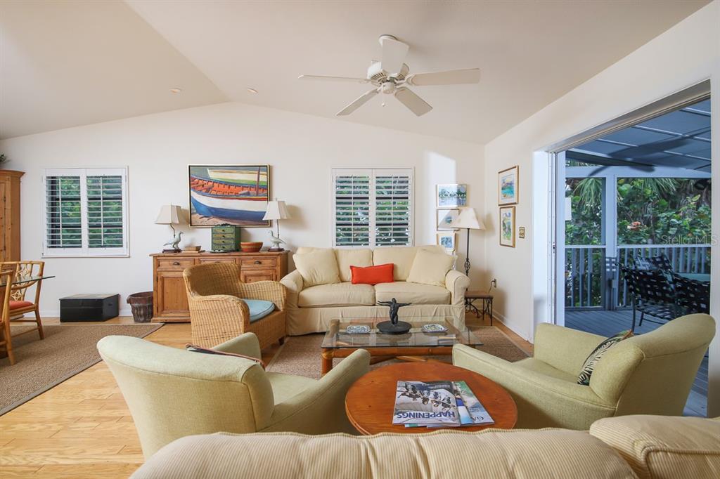 212 Pilot Street Boca Grande, FL 33921 - Photo 11 of 43 a living room with furniture and a large window