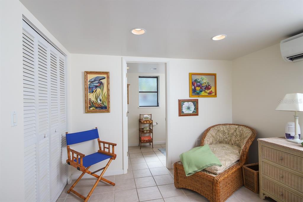 212 Pilot Street Boca Grande, FL 33921 - Photo 22 of 43 a living room with furniture and a lamp