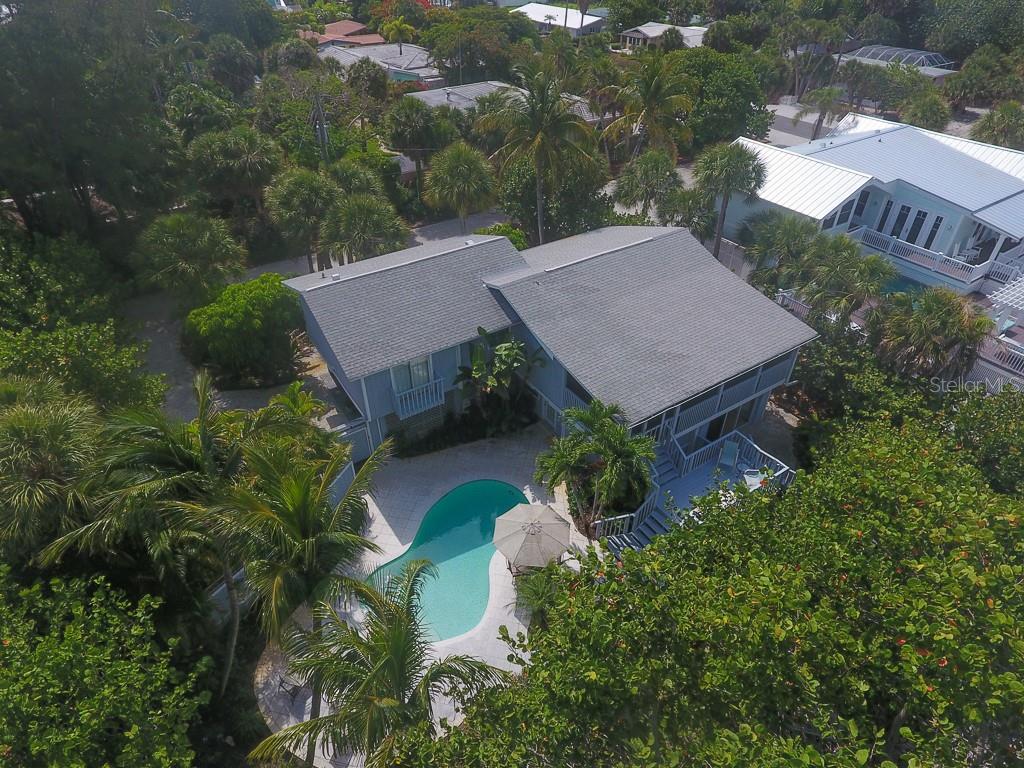 212 Pilot Street Boca Grande, FL 33921 - Photo 43 of 43 an aerial view of a house with a garden