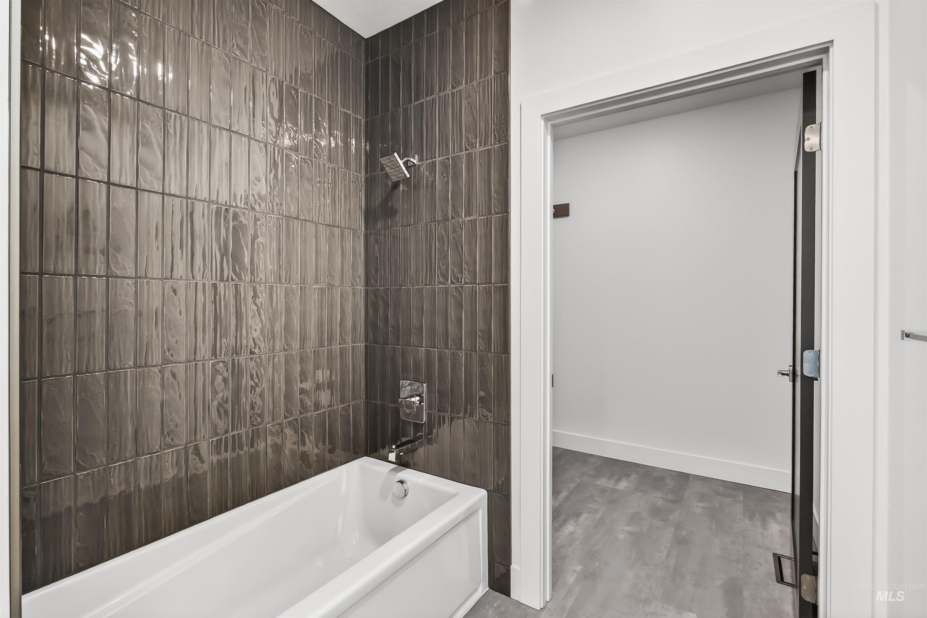 3710 22nd Street Lewiston, ID 83501 - Photo 12 of 36 Full bath featuring tub / shower combination and light wood finished floors