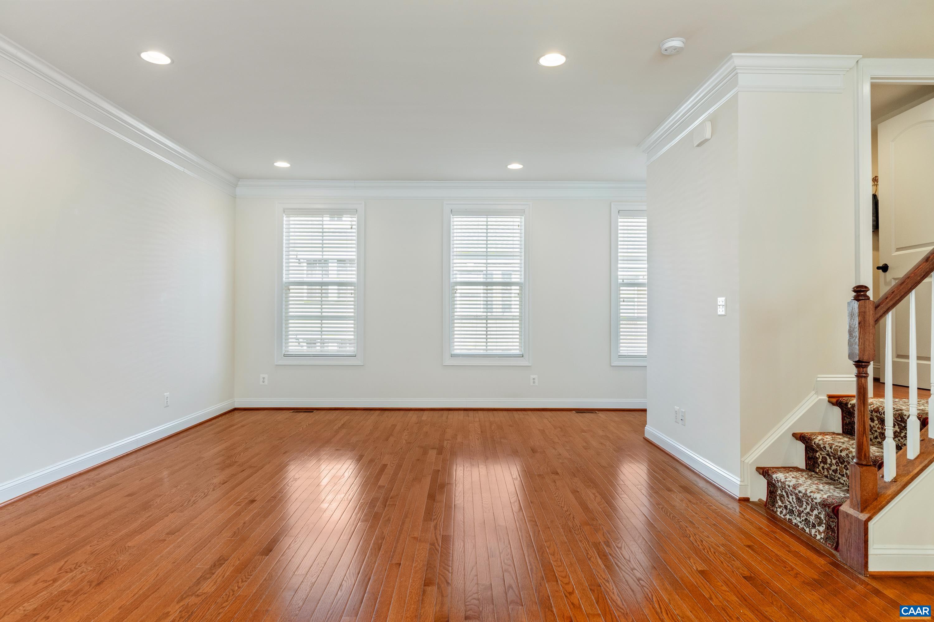 408 Samara Court Charlottesville, VA 22903 - Photo 12 of 44 an empty room with wooden floor and windows