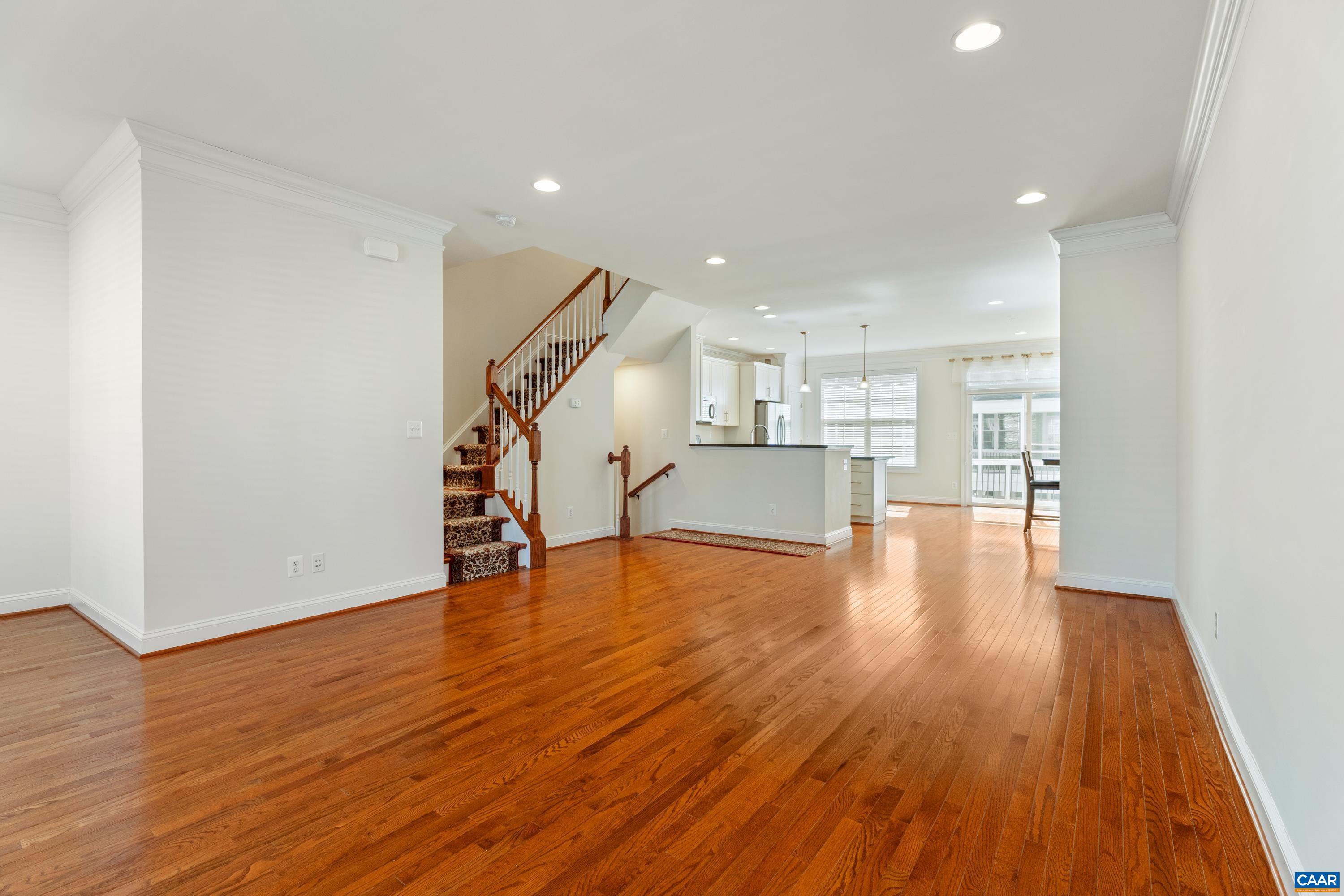 408 Samara Court Charlottesville, VA 22903 - Photo 15 of 44 a view of empty room with wooden floor and equipment