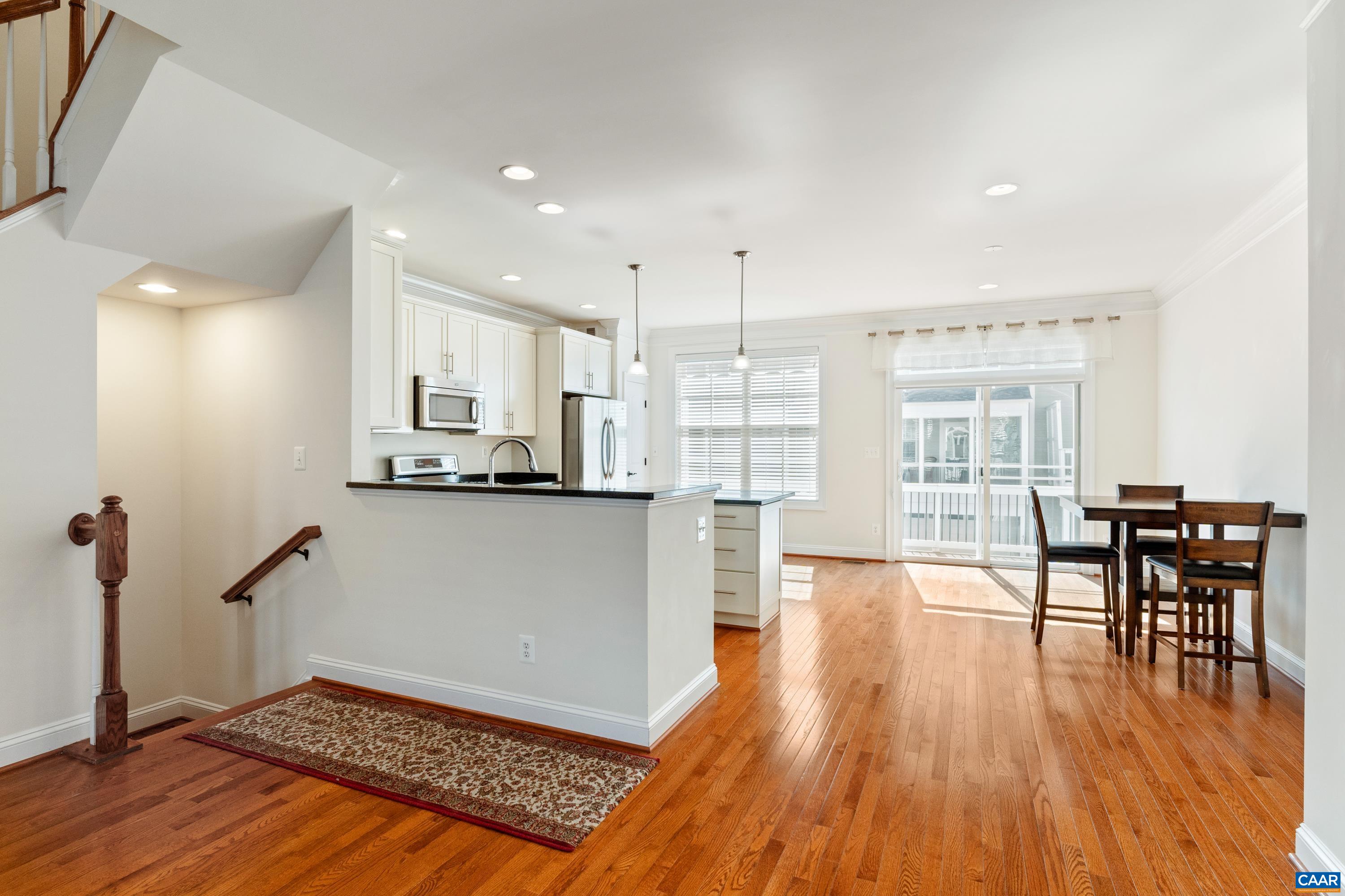 408 Samara Court Charlottesville, VA 22903 - Photo 17 of 44 a view of kitchen with furniture and wooden floor