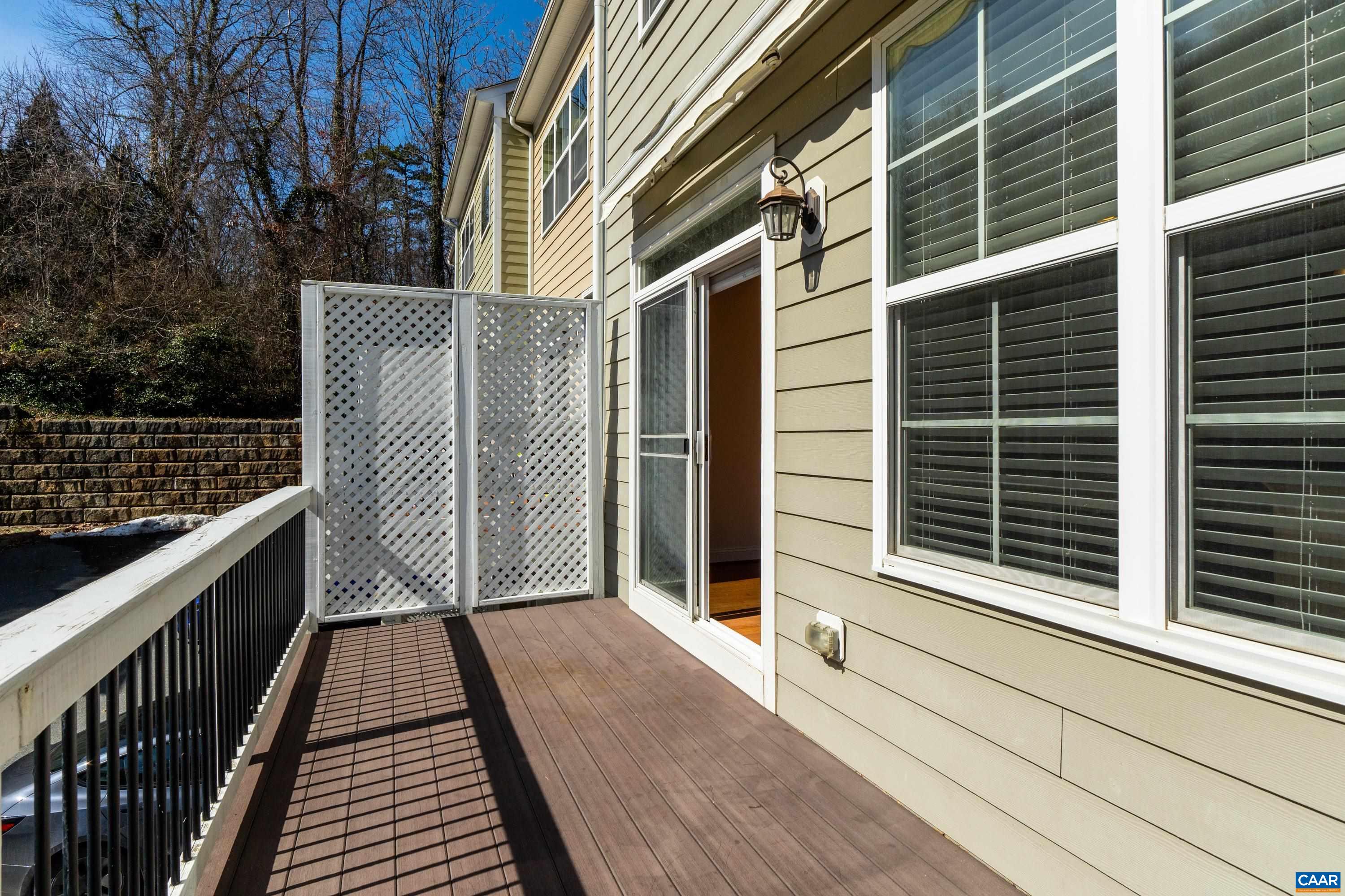 408 Samara Court Charlottesville, VA 22903 - Photo 24 of 44 a balcony view with a wooden floor and fence