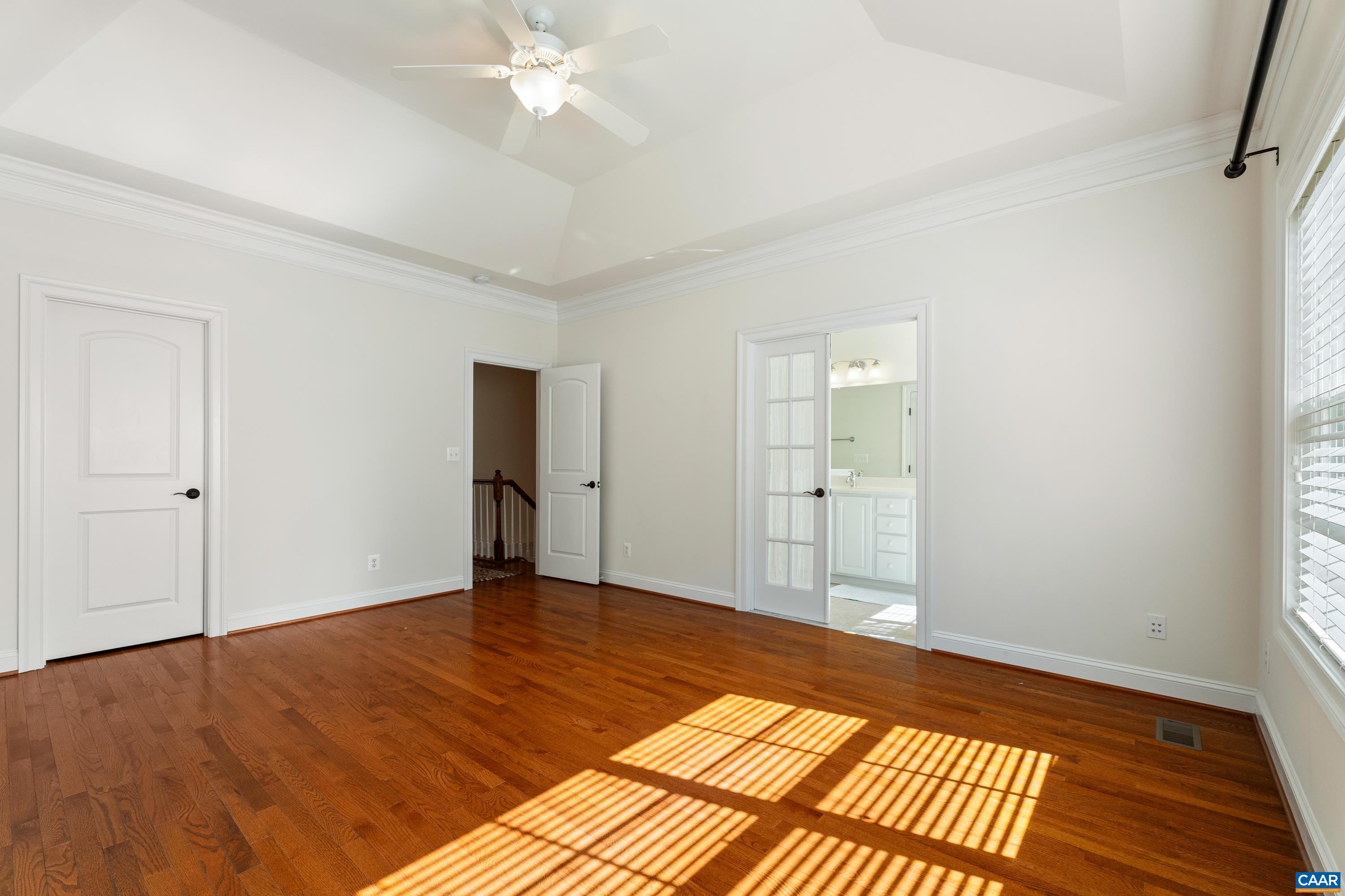 408 Samara Court Charlottesville, VA 22903 - Photo 28 of 44 a view of an empty room with wooden floor