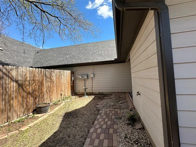 a view of a back yard of the house