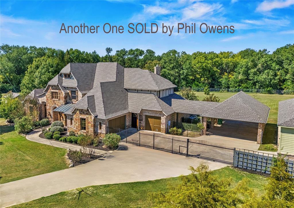 an aerial view of a house with garden