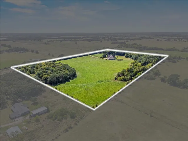 a view of a swimming pool with an outdoor seating and mountain view