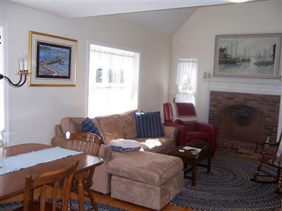 78 Richardson Road Centerville, MA 02632 - Photo 7 of 20 a living room with furniture and a fireplace