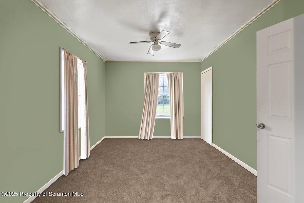 1411 Watson Street Scranton, PA 18504 - Photo 22 of 38 wooden floor and window in an empty room
