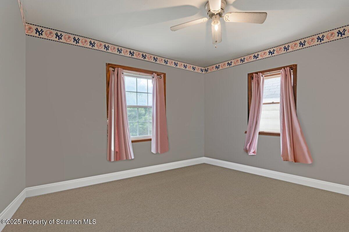 1411 Watson Street Scranton, PA 18504 - Photo 25 of 38 a view of an empty room with a window