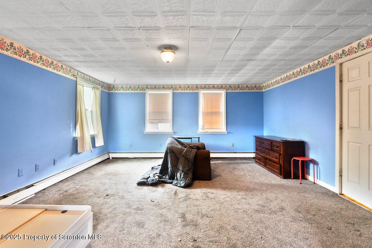 1411 Watson Street Scranton, PA 18504 - Photo 28 of 38 a room with furniture and windows