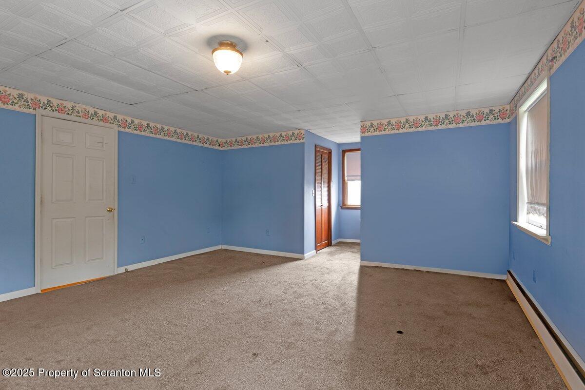 1411 Watson Street Scranton, PA 18504 - Photo 32 of 38 a view of an empty room with a window
