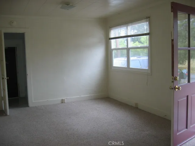 an empty room with a window