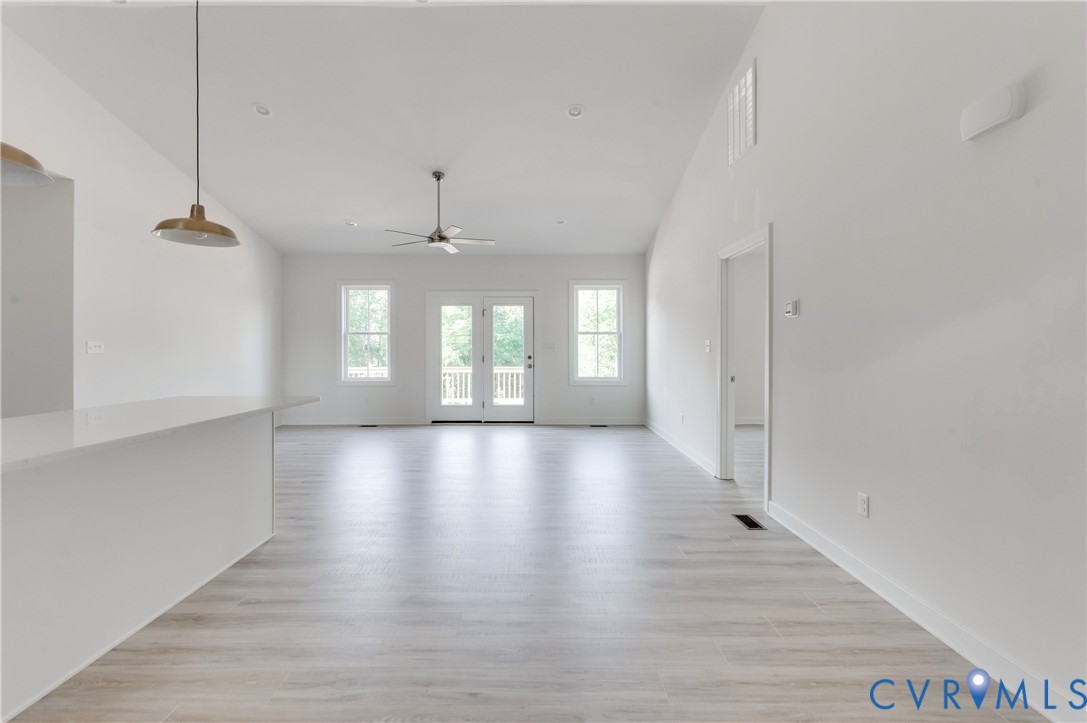 1393 Broad St Road Oilville, VA 23129 - Photo 3 of 39 Unfurnished living room featuring light wood-style