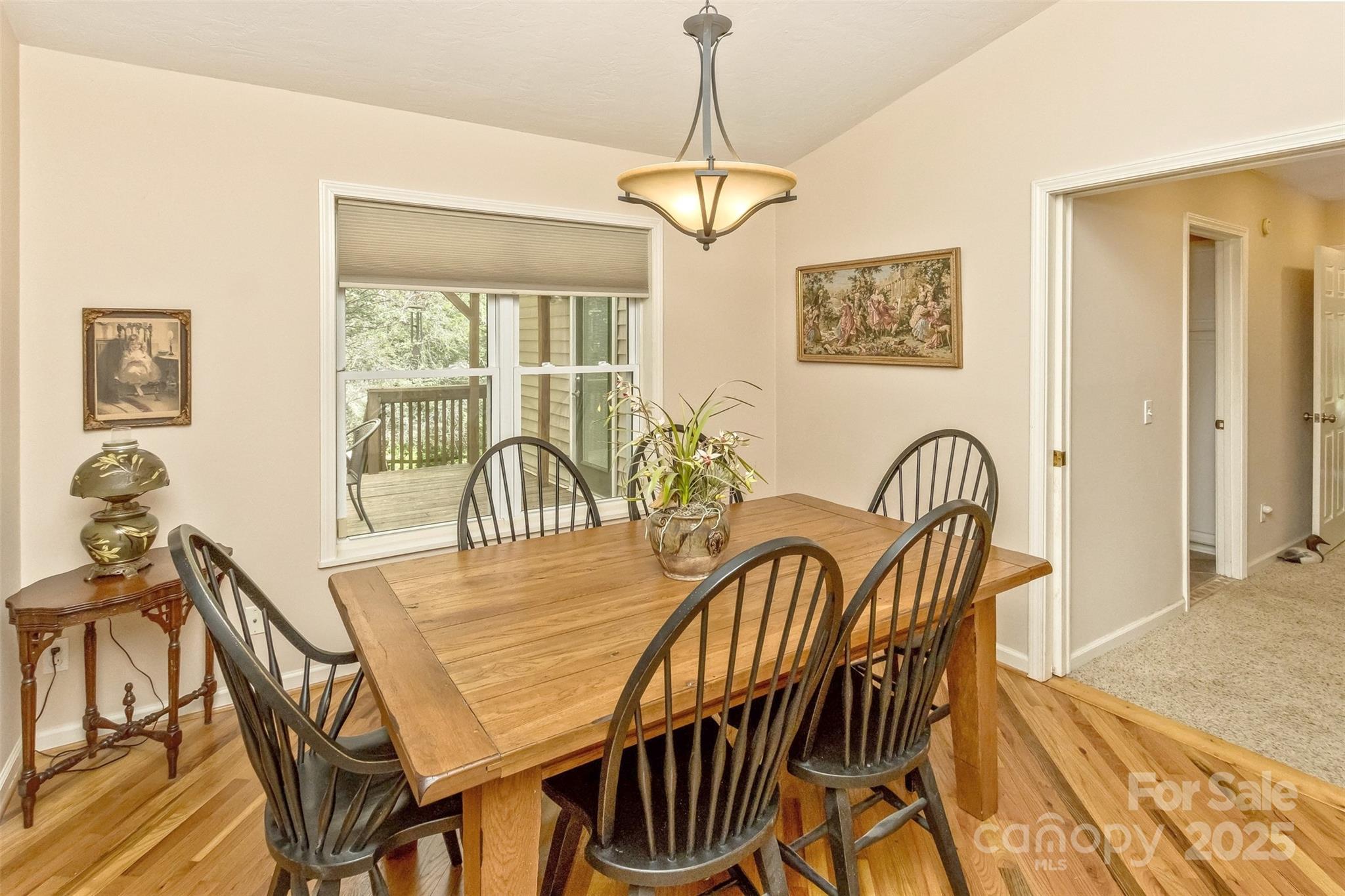 15 Beaverdam Knoll Road Asheville, NC 28804 - Photo 11 of 39 a view of a dining room with furniture window and outside view