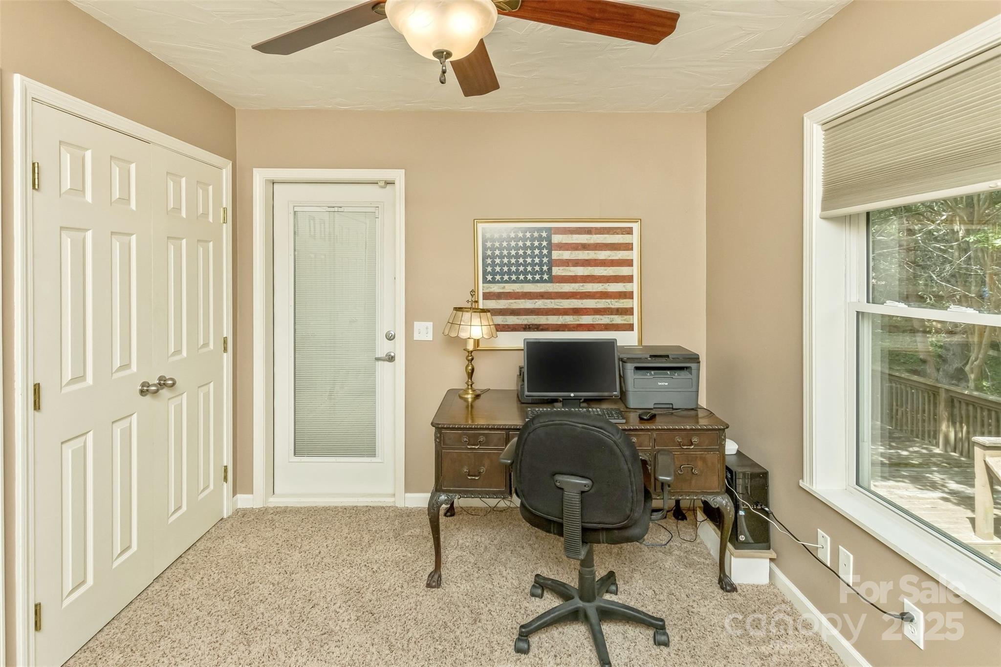 15 Beaverdam Knoll Road Asheville, NC 28804 - Photo 18 of 39 a view of a workspace with furniture and a window