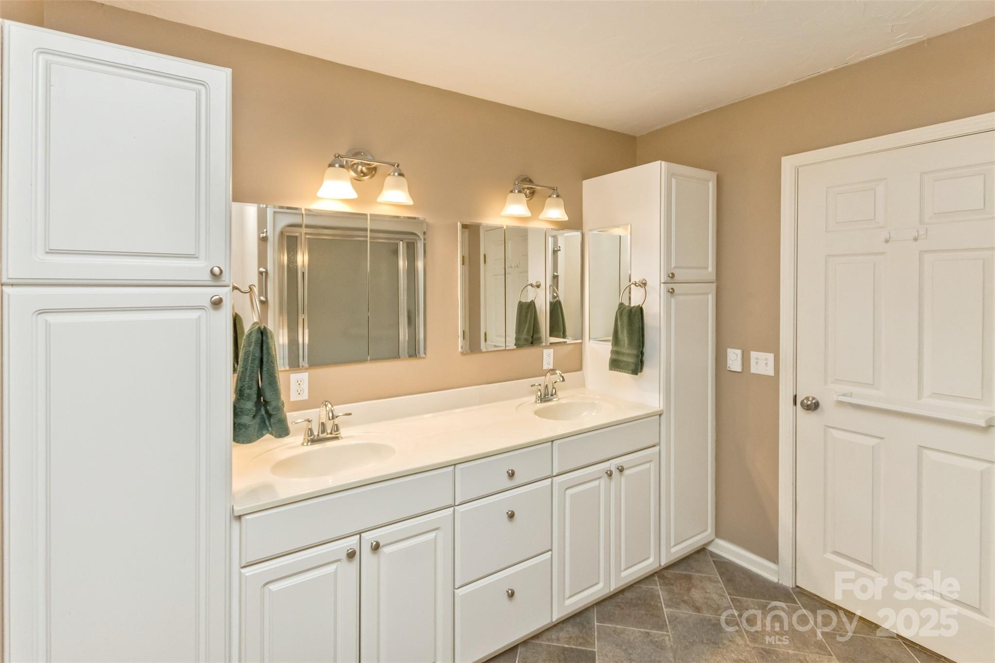 15 Beaverdam Knoll Road Asheville, NC 28804 - Photo 19 of 39 a bathroom with a granite countertop sink and a mirror